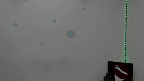 Media: A video of a cloudy sky with five snowflake-shaped balloons floating, one red and one black. A green LED strip runs vertically on the right, and a red and white sign with a hand gesture is partially visible at the bottom.