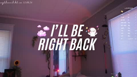 Media: A video of a dimly lit, pastel-themed bedroom with pink and purple accents. The text \"I'LL BE RIGHT BACK\" is superimposed, with a cartoon cat icon.