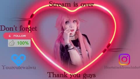 Media: Video of a young person with long pink hair, wearing black clothing, with a neon pink heart-shaped light. Text reads \"Stream is over\" and \"Don't forget\" with heart icons.